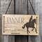 Eventer Barn Decor plaque with eventer canter horse image, Early American wood stain color, and font choice . Hung with a black suede cord